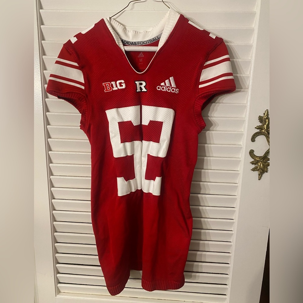 Eric LeGrand's No. 52 Football Jersey retired Rutgers Scarlet Knights